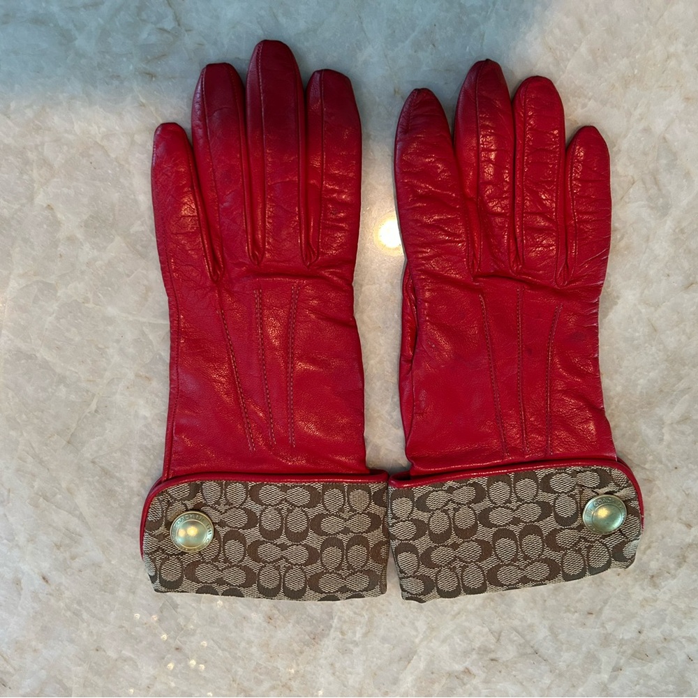 Red Coach Monogram Leather gloves. Preowned. Great condition.